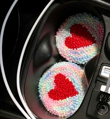 Pair of punch needle car coasters - rainbow yarn and sparkly hearts
