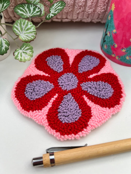 Punch needle mug-rug / coaster - funky 70s flower